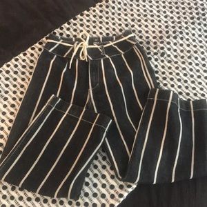 Striped canvas pants.